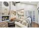 Open living room with fireplace, high ceilings, modern décor, and easy access to the kitchen at 4222 Hartwood Ln # 1202, Tampa, FL 33618