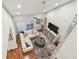 Bright and airy living room featuring a modern white sectional sofa, and a stylish area rug at 4222 Hartwood Ln # 1202, Tampa, FL 33618