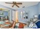 Home office has a daybed, mirrors and natural light at 4222 Hartwood Ln # 1202, Tampa, FL 33618