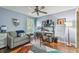 Comfortable home office features a ceiling fan, daybed, natural light and modern decor at 4222 Hartwood Ln # 1202, Tampa, FL 33618