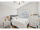 Bright bedroom featuring vaulted ceilings, soft natural light, and neutral decor at 1010 Elm Grove Ln, Valrico, FL 33596