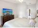 Bright bedroom featuring a large TV and dresser at 1010 Elm Grove Ln, Valrico, FL 33596