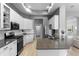 Well-equipped kitchen with granite countertops, stainless steel appliances, and a convenient island at 10502 Brentford Dr, Tampa, FL 33626