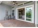 Covered patio with brick flooring and an outdoor seating area perfect for relaxation and entertaining at 10502 Brentford Dr, Tampa, FL 33626