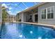 Beautiful pool area with ample space for lounging and entertaining, and a screened enclosure at 10502 Brentford Dr, Tampa, FL 33626