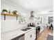 Bright kitchen featuring stainless steel appliances and an adjacent dining area at 106 W Louisiana Ave, Tampa, FL 33603