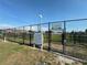 View of the community dog park with separate fenced areas for large and small dogs and a water station at 10953 Winter Crest Dr, Riverview, FL 33569
