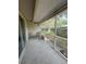 Relaxing screened porch with tiled flooring and comfortable seating, offering a peaceful outdoor retreat at 10953 Winter Crest Dr, Riverview, FL 33569