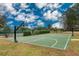 Well-maintained basketball court in a community, perfect for sports and recreation at 13038 Royal George Ave, Odessa, FL 33556