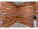 Walk-in closet lined with cedar wood, featuring ample shelving and hanging space at 13038 Royal George Ave, Odessa, FL 33556