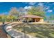 Community area with a covered picnic area, basketball court, and walking path at 13038 Royal George Ave, Odessa, FL 33556