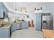 Spacious kitchen boasts stainless steel appliances, granite countertops, and easy access to living areas at 13038 Royal George Ave, Odessa, FL 33556