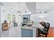 Bright kitchen featuring granite counters, modern lighting, and an open design at 13038 Royal George Ave, Odessa, FL 33556