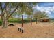 Community playground area featuring swings and picnic benches at 13038 Royal George Ave, Odessa, FL 33556