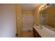 Bathroom features a bathtub with shower, linoleum flooring, and a vanity at 13218 Parkhurst Ct, Riverview, FL 33569