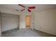 Simple bedroom with a ceiling fan and closet at 13218 Parkhurst Ct, Riverview, FL 33569