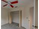 Simple bedroom with a ceiling fan and a closet at 13218 Parkhurst Ct, Riverview, FL 33569