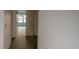 Hallway with a glimpse into a bedroom at 13218 Parkhurst Ct, Riverview, FL 33569