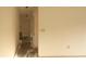 Hallway featuring neutral walls, leading to other rooms at 13218 Parkhurst Ct, Riverview, FL 33569