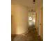 Hallway with curved wall leading to the living area and bedrooms at 13218 Parkhurst Ct, Riverview, FL 33569
