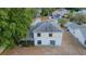 Two-story home with a screened-in porch and sliding glass doors, seen from above at 13218 Parkhurst Ct, Riverview, FL 33569