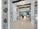Inviting foyer featuring tile flooring, decorative glass, and natural light creating a warm entrance at 1416 Leland Dr # 49, Sun City Center, FL 33573
