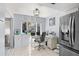 Bright home office features a workstation, desk, and a large window at 1416 Leland Dr # 49, Sun City Center, FL 33573