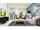 Bright, open-concept living room with modern furnishings and stylish decor at 208 27Th Se St, Ruskin, FL 33570
