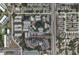 Overhead view of the condo community featuring lush landscaping, a pool, and proximity to Elm Street at 2139 Elm St # 308, Dunedin, FL 34698