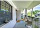 Cozy balcony with seating, railing, and view, perfect for enjoying the outdoors in a condo at 2139 Elm St # 308, Dunedin, FL 34698