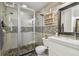 Modern bathroom features tiled shower, sleek vanity, and stylish mirror at 2505 W Azeele St, Tampa, FL 33609