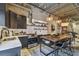 Modern kitchen features stainless steel appliances, floating shelves and a large center island with bar seating at 2505 W Azeele St, Tampa, FL 33609