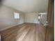 Bright living room with new flooring, fresh paint, and plenty of natural light at 2713 W Chestnut St, Tampa, FL 33607