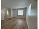 Spacious living room featuring new floors and neutral walls at 2713 W Chestnut St, Tampa, FL 33607