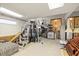 Spacious basement with ample storage and workout equipment at 2886 Green Meadow Ct, Clearwater, FL 33761