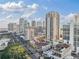An aerial view of a dense city landscape with palm trees and high-rise buildings at 300 Beach Ne Dr # 401, St Petersburg, FL 33701