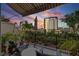 Relaxing balcony with outdoor seating and views of the city skyline at sunset at 300 Beach Ne Dr # 401, St Petersburg, FL 33701