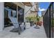Enjoy relaxing outdoors on this private balcony furnished with comfortable seating and potted plants at 300 Beach Ne Dr # 401, St Petersburg, FL 33701