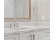 Bathroom vanity with a white countertop, modern faucet, and shaker cabinets at 300 Beach Ne Dr # 401, St Petersburg, FL 33701