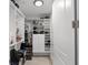 Walk-in closet offering custom shelving and ample storage space at 300 Beach Ne Dr # 401, St Petersburg, FL 33701