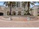 Elegant entrance to Parkshore Plaza with beautiful landscaping and architectural details at 300 Beach Ne Dr # 401, St Petersburg, FL 33701
