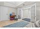 Office features french doors, natural light, and flows to the living room at 300 Beach Ne Dr # 401, St Petersburg, FL 33701