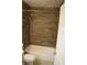 Bathroom with modern tile shower/tub with updated fixtures at 3421 E Powhatan Ave, Tampa, FL 33610