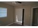 This bedroom has carpeted floors and a closet for convenient storage solutions at 3421 E Powhatan Ave, Tampa, FL 33610