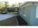 A clean carport provides covered parking and convenient access to the house at 3421 E Powhatan Ave, Tampa, FL 33610