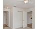 Bright bedroom with neutral carpet, a ceiling fan, and closet space at 406 S Pebble Beach Blvd, Sun City Center, FL 33573