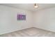 Bedroom with neutral carpet and a window offering natural light at 406 S Pebble Beach Blvd, Sun City Center, FL 33573