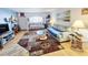 Inviting living room with cozy seating, nautical decor, and a bright, airy atmosphere at 504 67Th Ave # 4, St Pete Beach, FL 33706