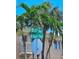 Image of '67th Ave' and 'Beach Plaza' street signs next to a palm tree and building at 504 67Th Ave # 4, St Pete Beach, FL 33706