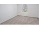 Clean and bright unfurnished bedroom with neutral carpet and a window at 5416 Camberwell Ln, Riverview, FL 33578